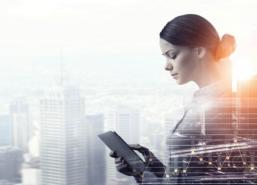 Attractive business lady working on tablet